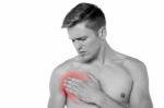 Young Man Having Chest Pain Stock Photo