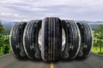 Car Tires In Row On The Street Stock Photo