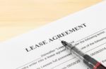 Lease Agreement Contract Document, Pen At Bottom Right Corner Stock Photo