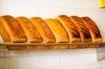Freshly Kneaded Grain And White Breads For Sale Stock Photo