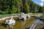 Ornamental Statues In A Pond Outside The Imperial Kaiservilla In Stock Photo