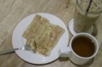 Breakfast Set Of Coffee Drink And Fried Ham Cheese Roti Stock Photo