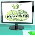 South Korean Won Represents Foreign Currency And Coinage Stock Photo