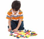 Boy Playing With Blocks Stock Photo