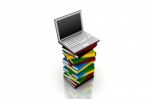 3d Laptop On Top Of A Pile Of Books Stock Photo