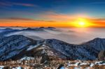 Winter Landscape With Sunset And Foggy In Deogyusan Mountains, South Korea Stock Photo