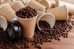 Coffee Beans And Coffee Cups Stock Photo