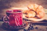 Continental Breakfast With Coffee And Croissant Stock Photo