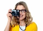 Young Girl With Camera Stock Photo
