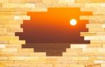 Crashed Brick Wall With Beautiful Sun Set Over The Sea Behind Stock Photo