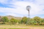 Windmill On The Farm In Namibia Stock Photo