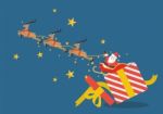 Santa Claus With Reindeer Sleigh Flying Out Of The Gift Box Stock Photo