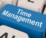 Time Management Key Shows Organizing Schedule Online Stock Photo