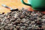 Coffee Beans On Wooden Stock Photo