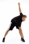 Man Doing Stretching Exercise Stock Photo