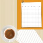 Weekly Planner Grid Sheet And Coffee Cup On Wood Background Stock Photo