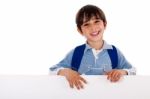 Boy Standing Behind The Blank Board Stock Photo