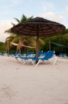 Beach Chairs And Umbrella Stock Photo
