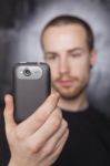 Male Holding Smartphone Stock Photo