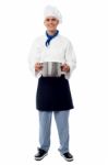 Male Chef Holding A Steel Saucepan Stock Photo