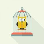 Owl In Bird Cage Stock Photo