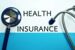 Health Insurance With Stethoscope Stock Photo