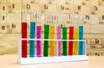 Chemistry Test Tubes In Front Of Periodic Table Stock Photo