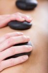 Woman Enjoying Massage At Beauty Spa Stock Photo