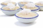 Right Front Cup Steamed Banana Cake In Cup On White Floor Stock Photo