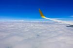 Clouds And Sky As Seen Through Window Of Aircraft Stock Photo