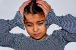 Little Girl With Headache Isolated Stock Photo