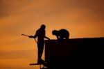 Silhouettes Of Worker Welder Stock Photo
