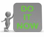 Do It Now Sign Shows Encouraging Immediate Action Stock Photo