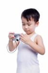Little Boy  Interesting Digital Compact Photo Camera Stock Photo