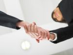Handshaking In Office Low Angle Stock Photo