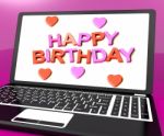Happy Birthday On Laptop Computer Screen Showing Online Greeting Stock Photo