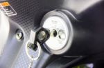 Motorbike Key In Ignition Keyhole Stock Photo