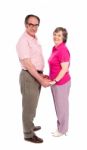 Smiling Love Couple Holding Hands Stock Photo