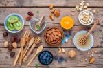 Ingredients For A Healthy Foods Background, Nuts, Honey, Berries Stock Photo