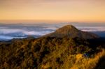 Beautiful Sun Rise On Top Mountain With Could And Camping Area Stock Photo