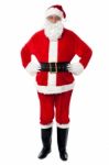 Cheerful Santa Claus Posing With Hands On Waist Stock Photo