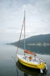 Yellow Yacht Moored On Lake Iseo At Sarnico Stock Photo