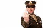 Angry Army Man Showing Middle Finger Stock Photo