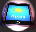Spain On Phone Displays Holidays And Sunny Weather Stock Photo