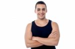 Smiling Young Fitness Guy, Arms Crossed Stock Photo