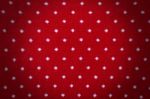 Red Knit With Polka Dot Background Stock Photo