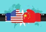 Conflict Between Usa And China With World Map Background Stock Photo