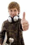 Boy With Headphone And Thumbs Up Stock Photo