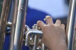Fingers Of A Musician Playing The Trumpet Stock Photo