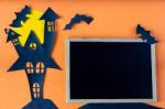 Halloween Concept With Haunted House Castle And Blackboard Stock Photo